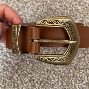 Tan leather belt with gold buckle